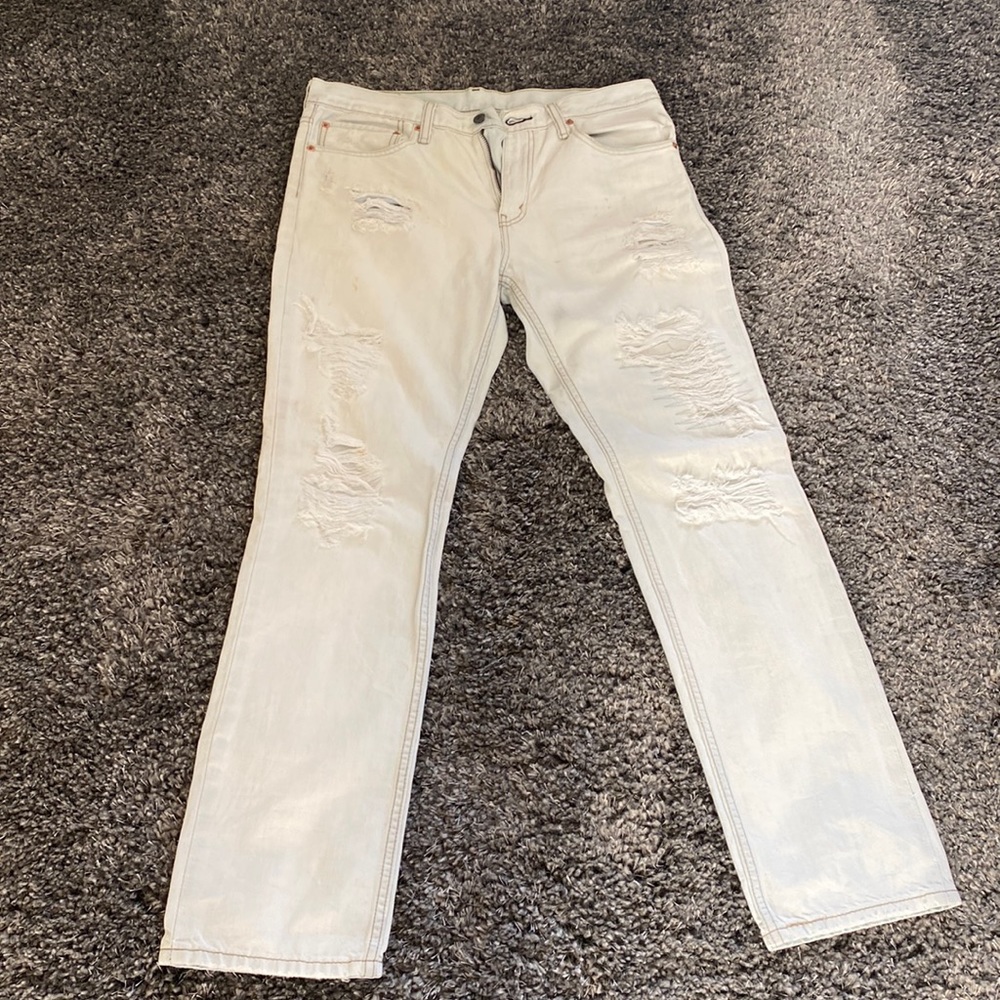 Distressed Levi’s With Light Rust Color Spots - image 1